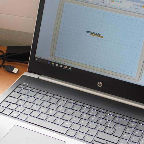 Schriftzug beim Entwurf am Computer